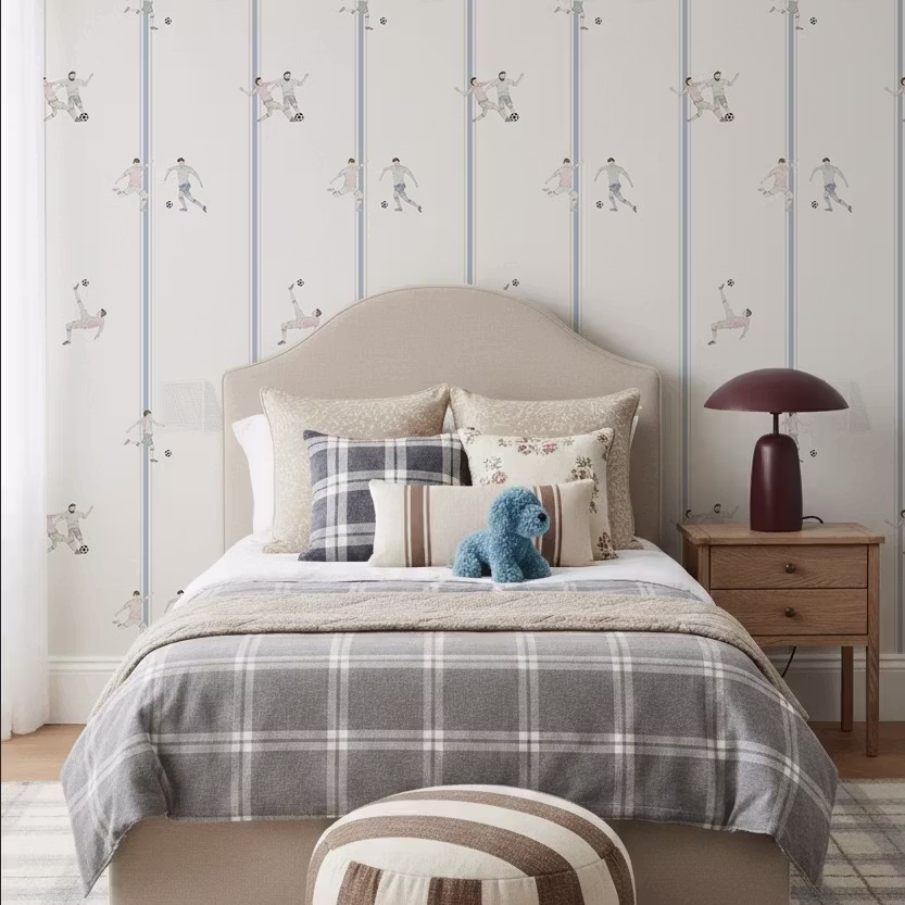 Custom wallpaper for a child's room with a football theme